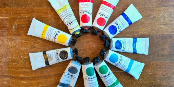 Picture of paint tubes laid out in a vaguely color-wheel fashion. Gosh, I wonder what pigments are in these Gamblin oil paints?