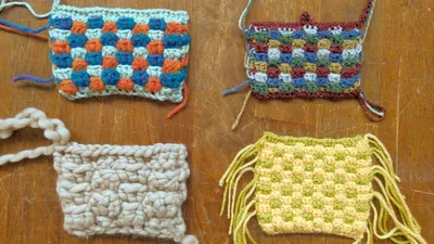 4 example swatches of the interlocking granny stitch in various colors and yarn weights