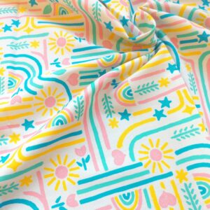 Canvas fabric with bright pink, yellow, blue, and green hand-drawn patterns scrunched up a little to show drape/weave.