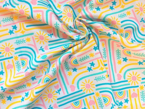 Canvas fabric with bright pink, yellow, blue, and green hand-drawn patterns scrunched up a little to show drape/weave.